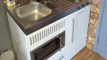 Fridge, microwave, electric kettle, toaster