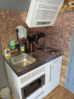 Fridge, microwave, electric kettle, toaster