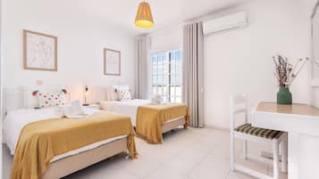 1 slaapkamer, een strijkplank/strijkijzer, reisbedje, gratis wifi