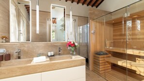 Shower, hair dryer, bidet, towels