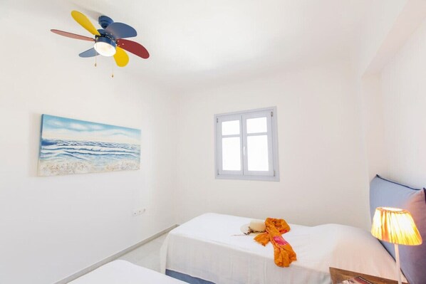 4 bedrooms, desk, iron/ironing board, travel crib