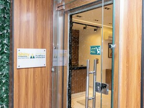 A hotel entrance with a sign for 'Shiny Pyramids Boutique Hotel' and a 'PULL' sign. - Shiny Pyramids Boutique Hotel (Giza)