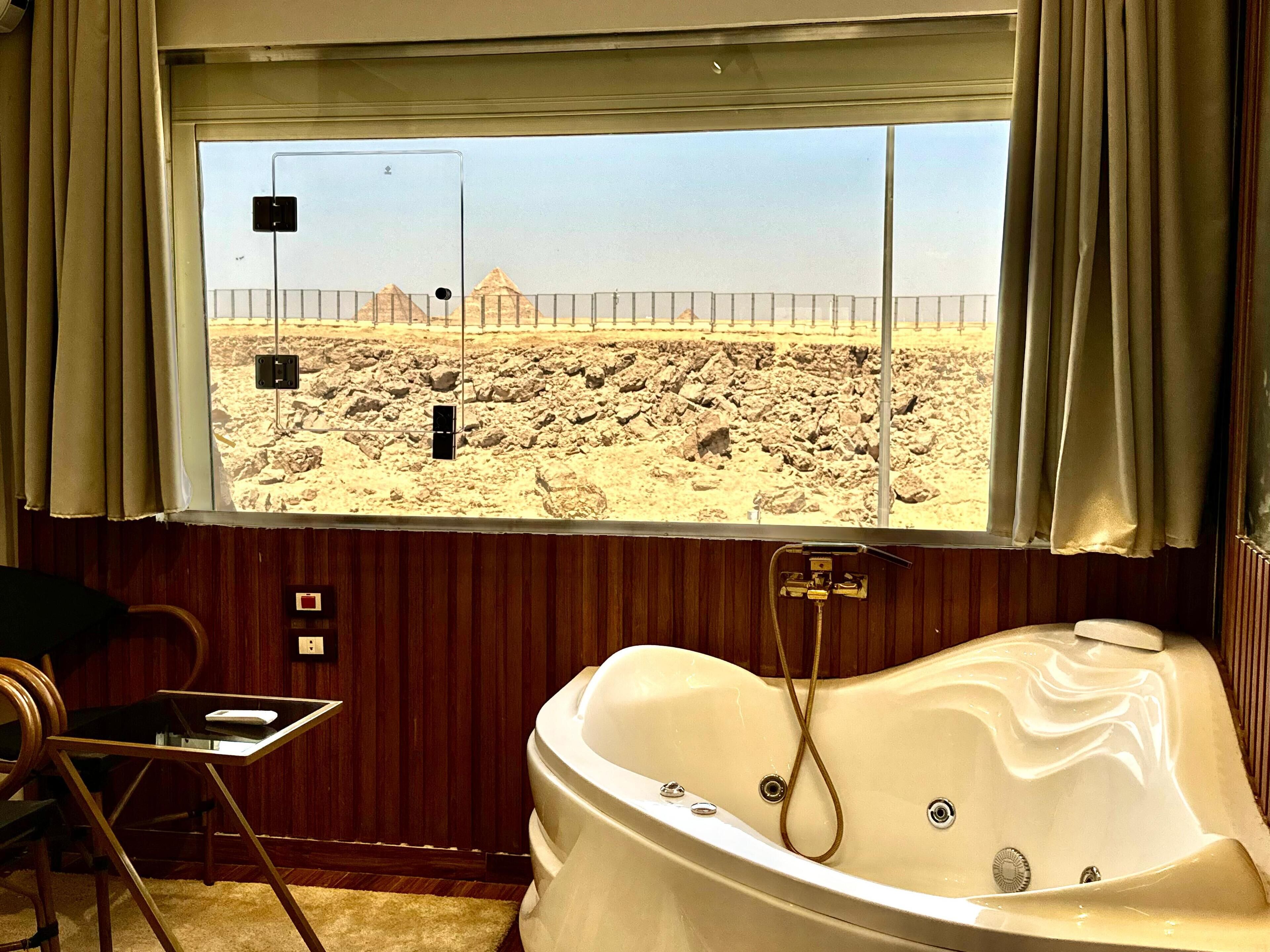 Luxury Jacuzzi Pyramids View Suite | Private spa tub