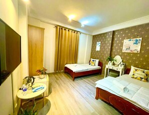 Deluxe Double or Twin Room, City View | Desk, blackout curtains, soundproofing, iron/ironing board - Anh Thien Hotel (Ho Chi Minh City)