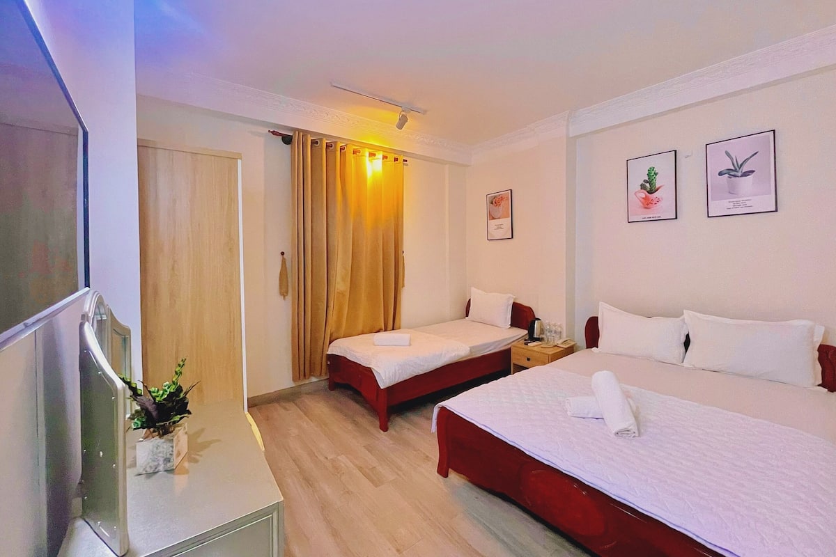 Family Triple Room, City View | Desk, blackout curtains, soundproofing, iron/ironing board (on request)