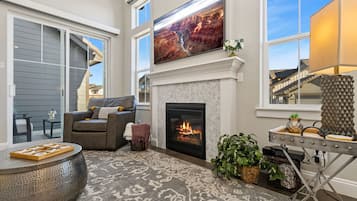 Smart TV, fireplace, books, offices