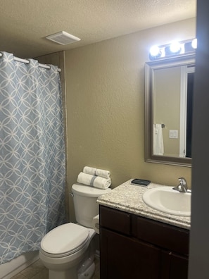 Hair dryer, towels, soap, toilet paper