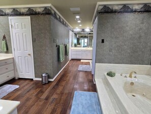 Jetted tub, hair dryer, towels, soap