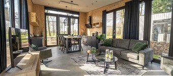 Modern Chalet by the River Maas