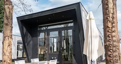 Modern Chalet by the River Maas