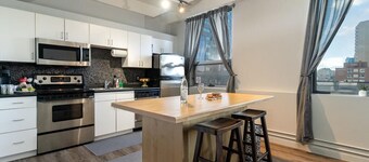 Chic 2-bedroom condo with WiFi, AC Close to Rogers Place in Edmonton