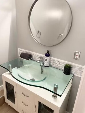 Hair dryer, towels, soap, shampoo