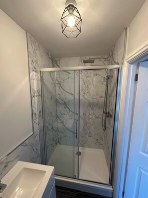 Apartment | Bathroom | Shower, hair dryer, towels, toilet paper - Storey Apartment - Downstairs 2bed Flat (Newbiggin-by-the-Sea)