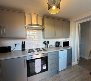 Apartment | Private kitchen | Fridge, microwave, oven, stovetop