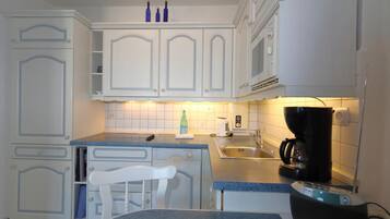 Fridge, microwave, coffee/tea maker, toaster