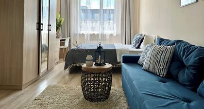 "Cancun" cozy studio in center of Almaty with WiFi, AC