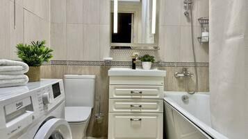 Hair dryer, towels, soap, toilet paper