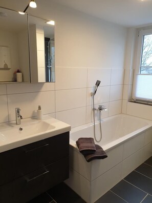 Shower, hair dryer, towels