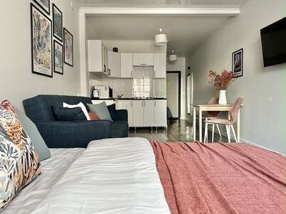 Cozy studio with WiFi and AC in center of Almaty