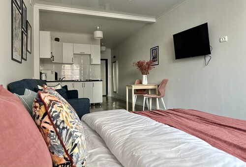 Cozy studio with WiFi and AC in center of Almaty