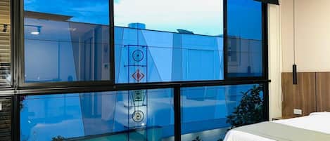 Deluxe appartement, uitzicht op de stad | Uitzicht vanuit de kamer