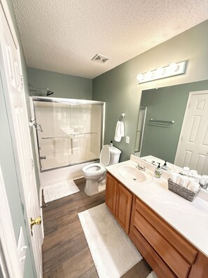 Hair dryer, towels, soap, toilet paper