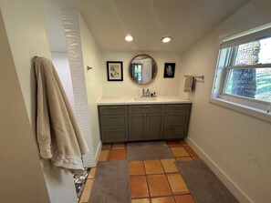Shower, towels, soap, toilet paper