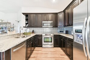 Fridge, microwave, oven, stovetop - Intracoastal Views Condo | 3 min walk to beach! (Indian Shores)