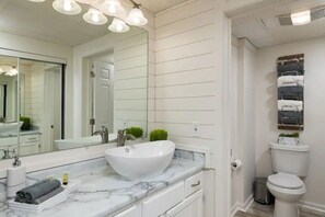 Hair dryer, towels, soap, toilet paper