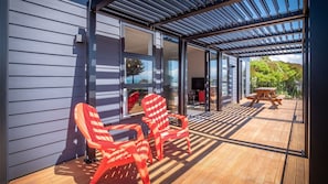 Outdoor dining - A new family home just a few steps from the beach (Pohara)