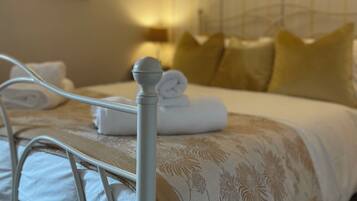 1 bedroom, desk, iron/ironing board, travel cot