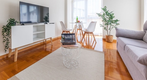 Charming Coastal Apartment Steps from the Beach