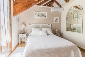 2 habitaciones, tabla de planchar con plancha y ropa de cama 