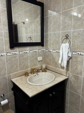 Hair dryer, towels, soap, toilet paper