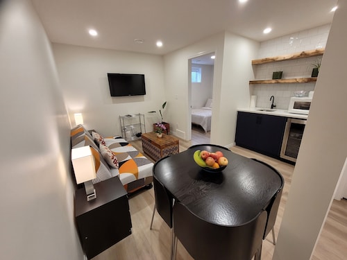 Cozy basement unit near restaurants, bars, stores, bus stations, and hospital.