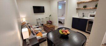 Cozy basement unit near restaurants, bars, stores, bus stations, and hospital.