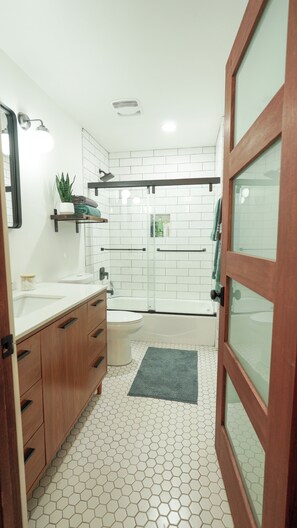 Shower, hair dryer, towels, soap