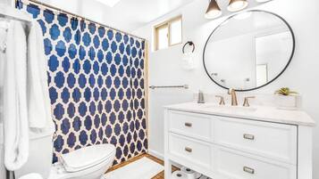 Hair dryer, towels, soap, shampoo