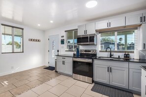 Fridge, microwave, dining tables