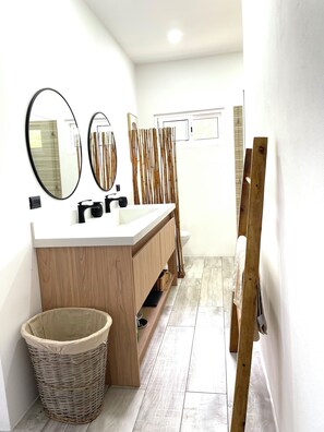 Shower, hair dryer, towels, soap