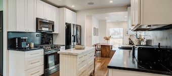 Modern Liberty Park 4BR Home with fast WIFI nice Hot tub and Tesla EV Charger