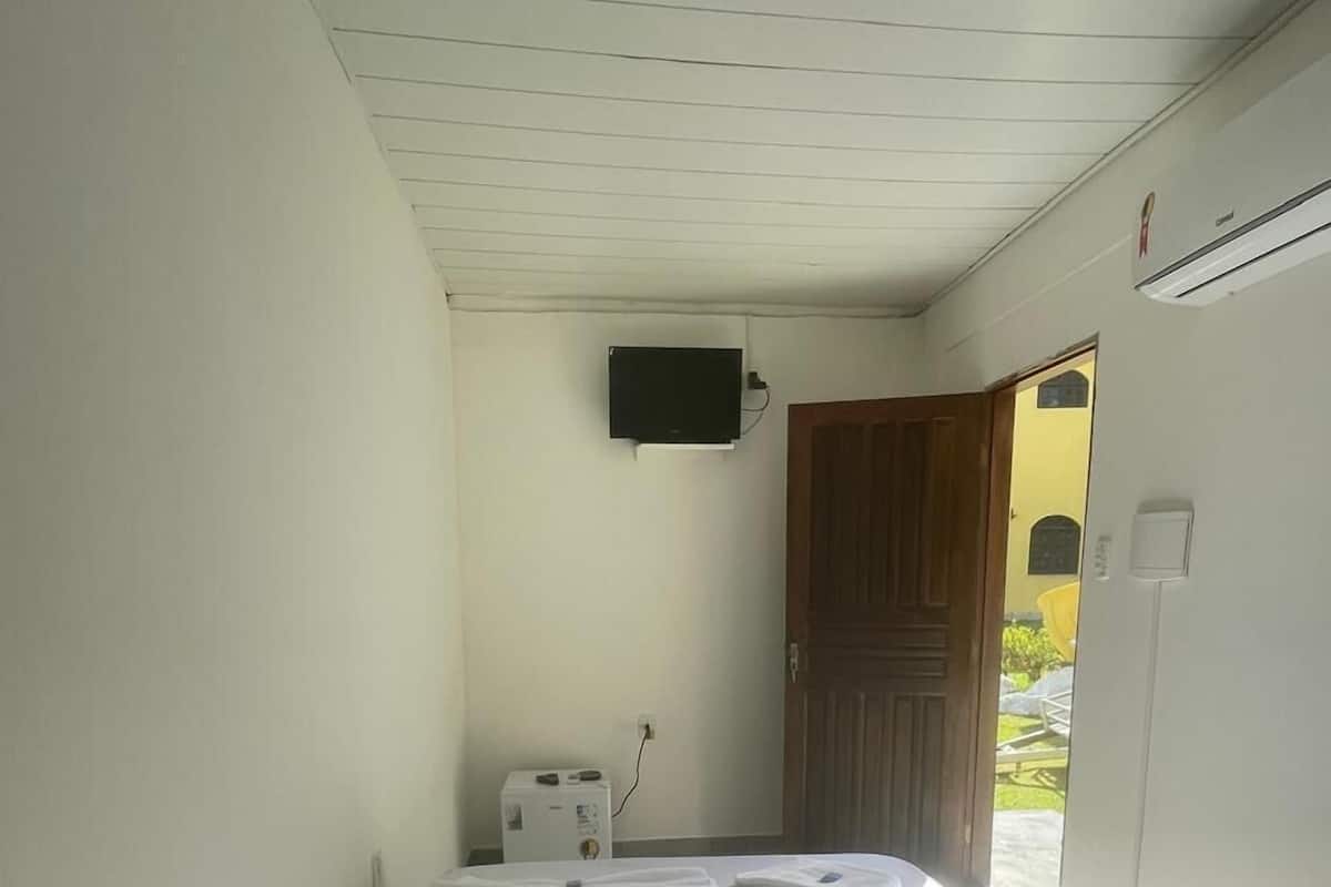 Camera familiare con 2 letti singoli, lanai, vista spiaggia | Ferro/asse da stiro, Wi-Fi gratuito