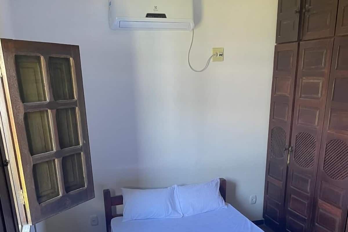 Tripla familiare, vista spiaggia | Ferro/asse da stiro, Wi-Fi gratuito