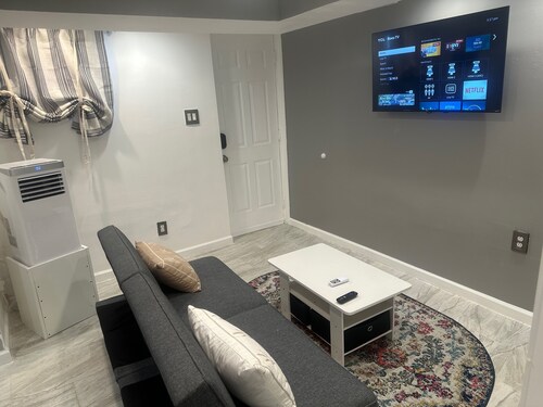 Charming 2-Bedroom Basement Retreat in Uniondale – AC, WiFi & More!