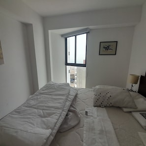 1 habitación, tabla de planchar con plancha, wifi y ropa de cama