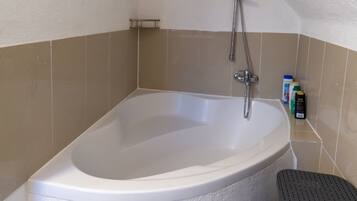 Hair dryer, towels, soap, shampoo