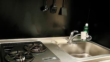 Luxury Suite, City View | Private kitchen | Fridge, microwave, stovetop, rice cooker