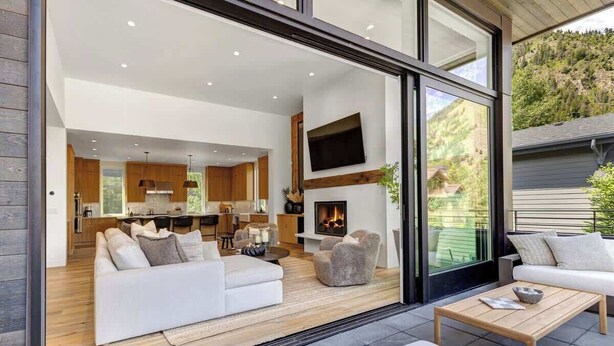 A modern interior with a living area, kitchen, and fireplace. - Abode at River Run, mountain modern, Ketchum (Ketchum)