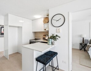 Apartment, 2 Bedrooms, Sea View | Private kitchen | Electric kettle, cleaning supplies, freezer, dining tables - Luxe 2 Bedroom Oceanview Retreat on Fern (Surfers Paradise)