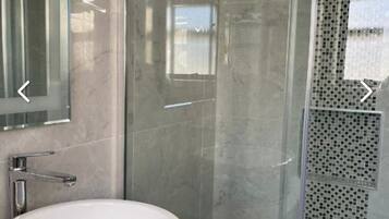 Shower, towels, soap, shampoo